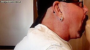 Homemade gloryhole DILF sucks and wanks cock in closeup