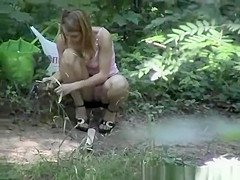 Hooker caught changing her clothes in forest