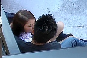 Hot Asian doll and guy are fucking on the roof