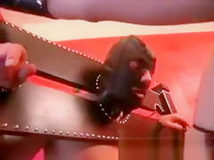 Hot brunette blows on masked guys