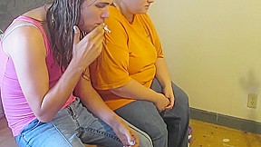 Hot girls smoking share a cigarette before eatting out her asshole and making her cum everywhere