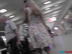 Hot upskirt porn with auburn-hair gal in a public place