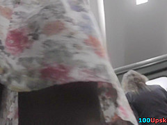Hot upskirt porn with auburn-hair gal in a public place