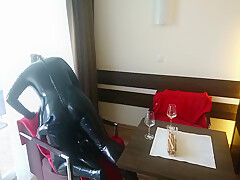 In Latex Covered Couple Enjoys A Good Drink