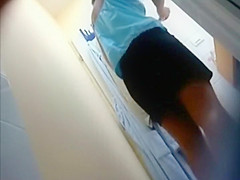 Incredible pale ass of a dressing girl