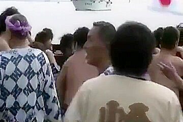 Japanese Bodybuilder Exhibiting At Matsuri On Public Beach