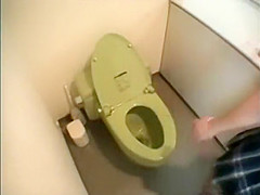 Japanese lady caught pissing in a toilet
