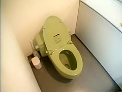 Japanese lady caught pissing in a toilet