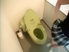 Japanese lady caught pissing in a toilet