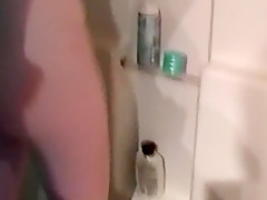 Kim shaves her legs