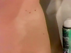 Kim shaves her legs