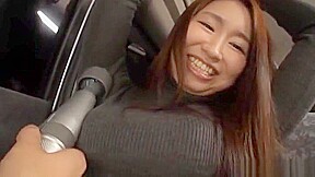 Kinky Japanese AV model gets her pussy toyed and gives head in a car