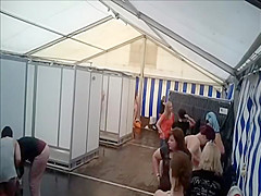 Lots of naked girls in a big public shower