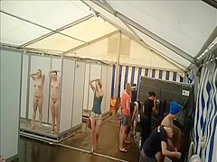 Lots of naked girls in a big public shower