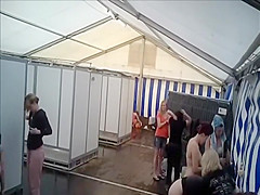 Lots of naked girls in a big public shower