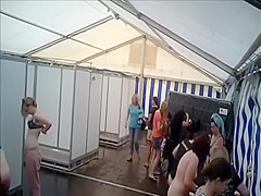 Lots of naked girls in a big public shower