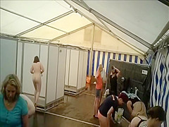 Lots of naked girls in a big public shower