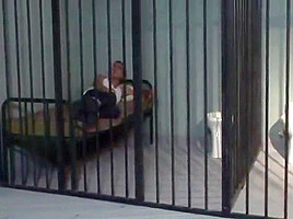 Man between bars