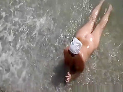Mature nudist couple fucking in the beach