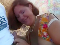 Mature threesome at the beach