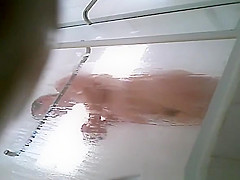 Milf taking shower in shower cabin