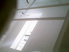 Milf taking shower in shower cabin