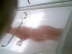 Milf taking shower in shower cabin