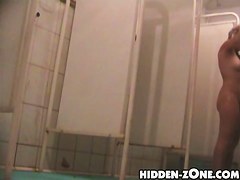 Milky white body seen in details on shower cam spy