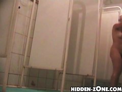Milky white body seen in details on shower cam spy