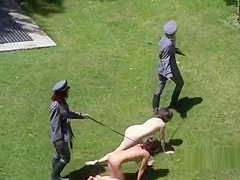 Mistresses in uniforms disgraced slaves in public