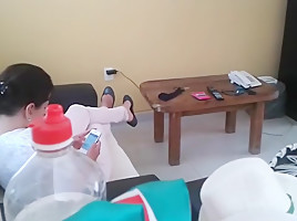 My cousin sitting and shoeplaying