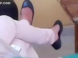 My cousin sitting and shoeplaying
