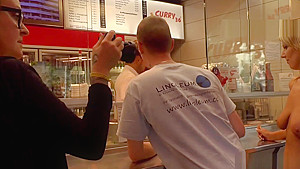 Naked blonde in line at fast food shop