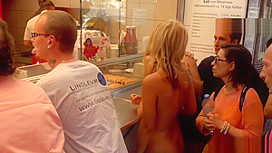 Naked blonde in line at fast food shop