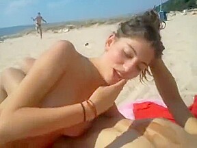 Naked lesbians licking each other on the beach