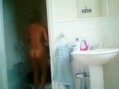 Naked wife with big boobs spied in bathroom