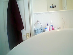 Naked wife with big boobs spied in bathroom