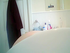 Naked wife with big boobs spied in bathroom