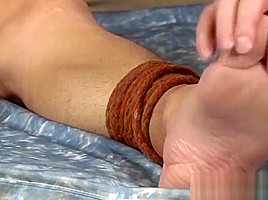 Nasty old man grabs tied up twinkies dick and jerks it off