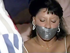 Native American model Trish tape gagged and tied up