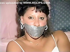 Native American model Trish tape gagged and tied up