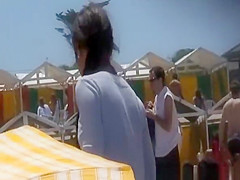 Nice ass brunette girl at beach