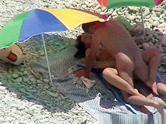 Nude woman sucks and fucks in beach