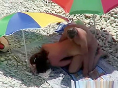 Nude woman sucks and fucks in beach