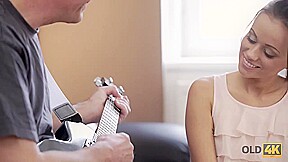 OLD4K  Old bass guitarist acquaints fan with his main instrument