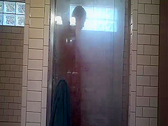 Old *** sitter viigorously rubbing clit and asshole in shower