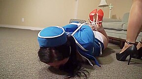 PLANE STEWARDESS (CAROLINE PIERCE) ALL TIED UP & GAGGED!