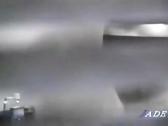 Peeping window movie in which an asian whore masturbates