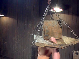 Plump breasted bimbo fisted during BDSM session