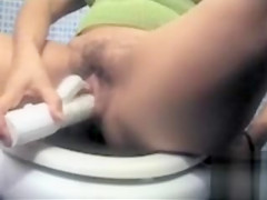 Plump granny satisfies her sexual needs with a toy